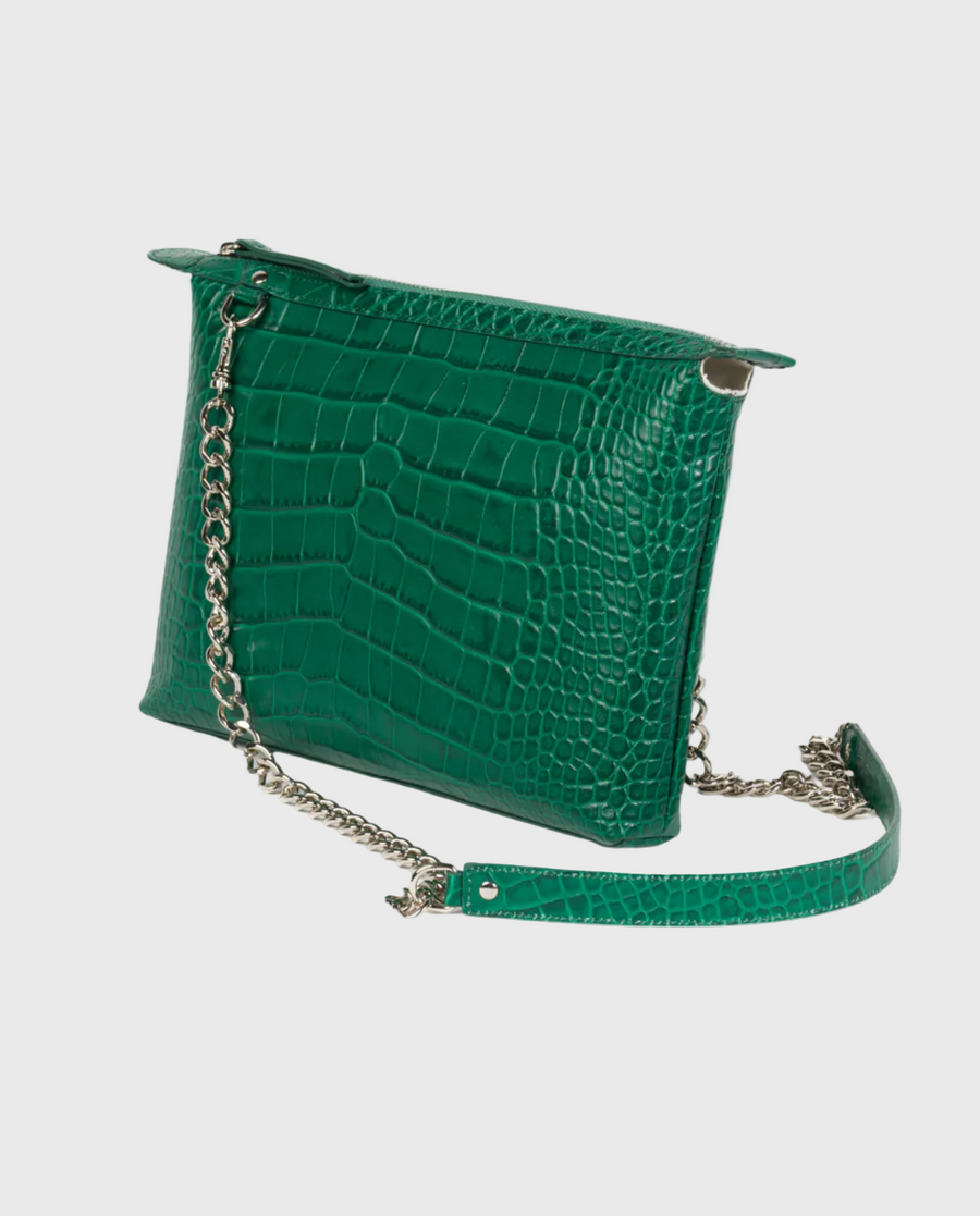 An emerald green croc-embossed leather crossbody bag with a silver-tone chain strap, displayed against a plain background.
