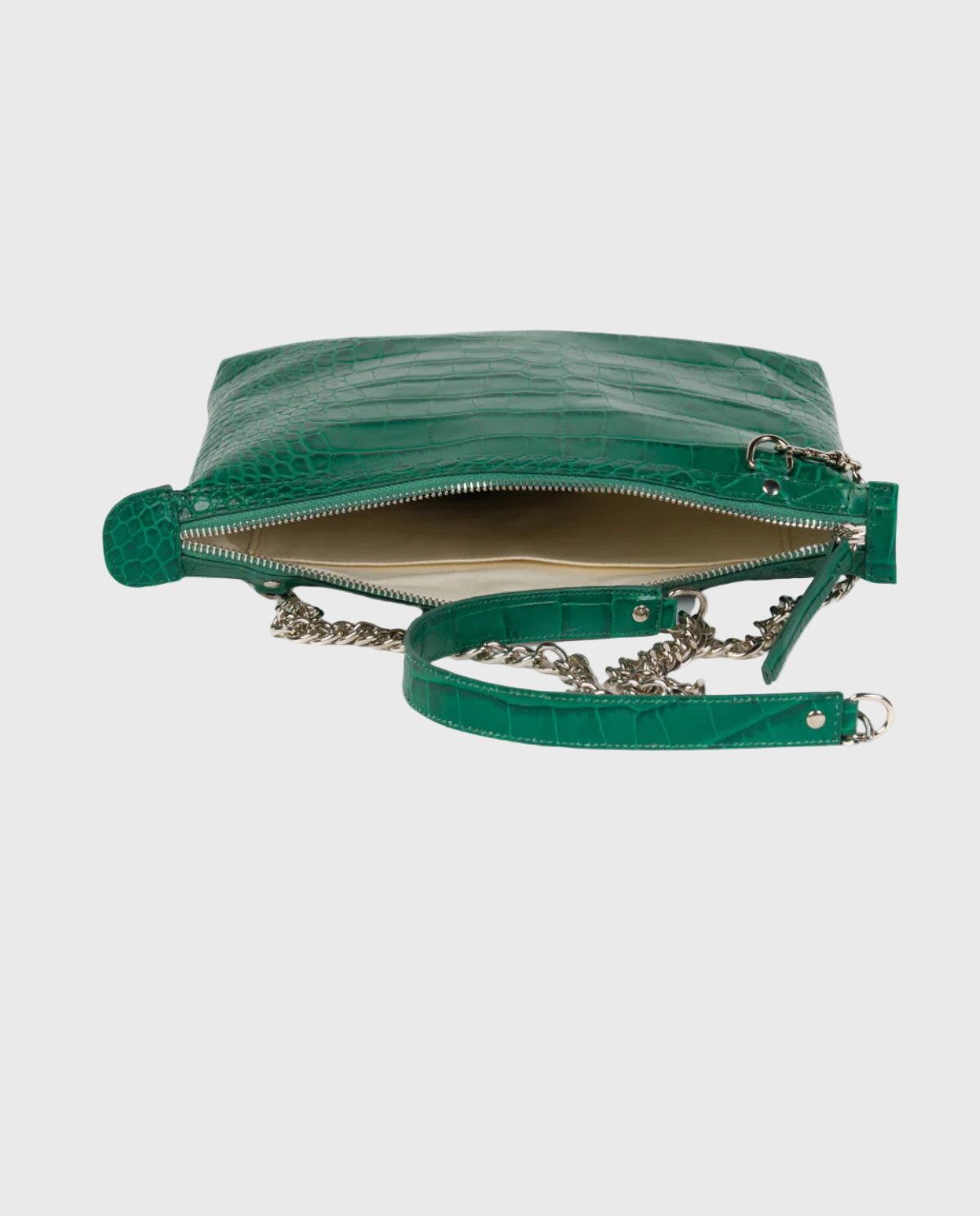 Green leather handbag with chain strap on a white background