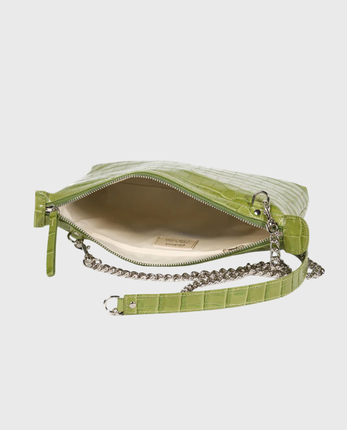 Green handbag with chain strap on a white background