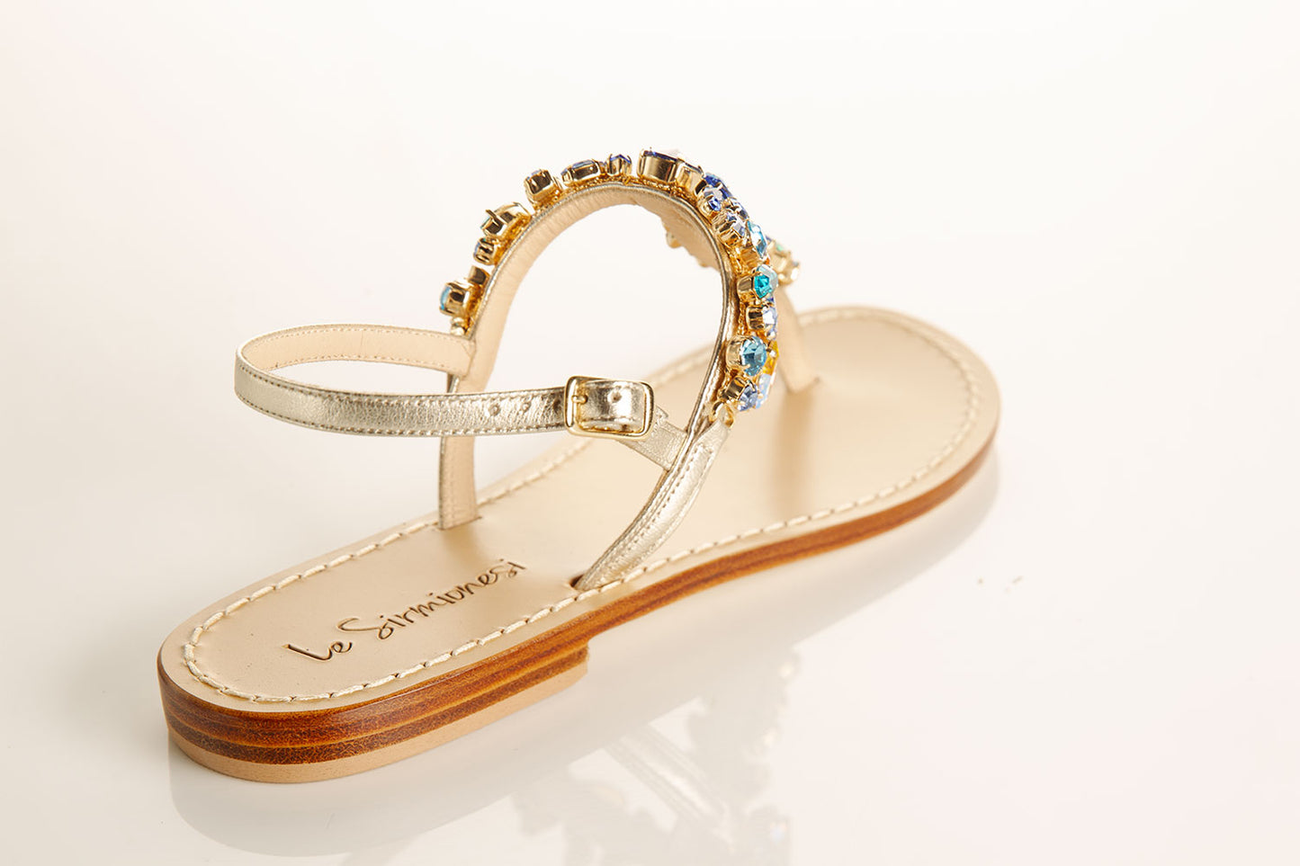 flat sandals with aqua Swarovski crystals, luxury sandals with crystal embellishment, Tuscan leather sandals, stylish thong strap sandals, comfortable flat sandals