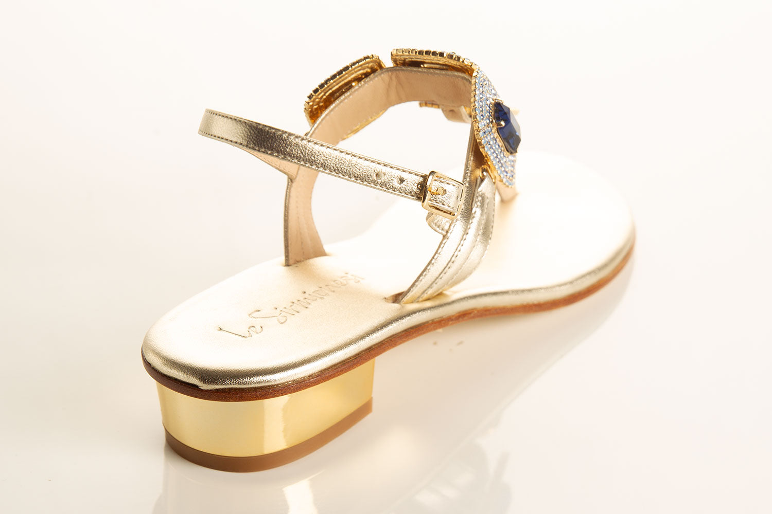 blue sandals with gold base, jewel sandals with swarovski stones, comfortable heel sandals, high-quality sandals, elegant footwear collection
